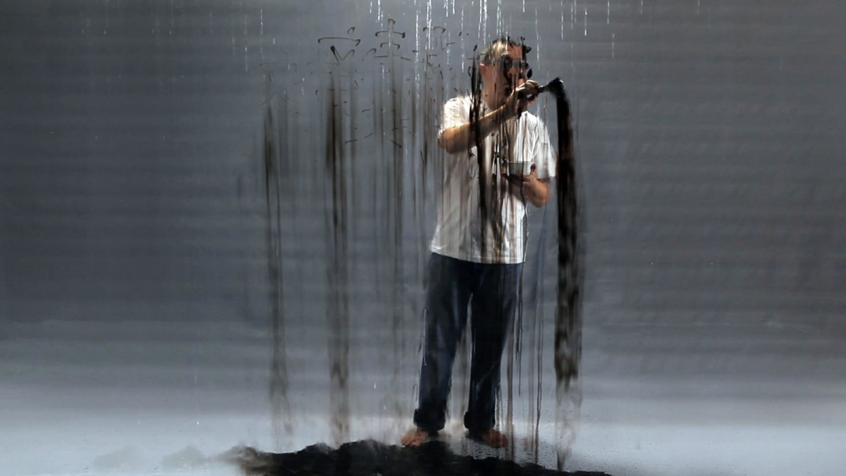 fx harsono writing in the rain performance video stills 2011